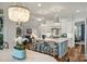 Dining area with views and elegant chandelier adjacent to the main kitchen at 299 Barber Loop, Mooresville, NC 28117