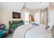 Bright, airy bedroom featuring green wooden side table and ceiling fan at 3420 Maryhurst Ln, Charlotte, NC 28226