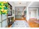 Inviting foyer featuring hardwood floors and a view into the spacious living room at 3420 Maryhurst Ln, Charlotte, NC 28226