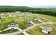 Aerial view of home and landscaped surroundings in a beautiful neighborhood at 3615 Kimber Ln, Sherrills Ford, NC 28673