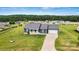 Beautiful single-story home with a two-car garage, manicured lawn, and inviting front porch at 3615 Kimber Ln, Sherrills Ford, NC 28673