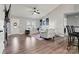 Bright living room showcasing hardwood flooring, light-colored walls, and access to a full view of the kitchen at 3615 Kimber Ln, Sherrills Ford, NC 28673