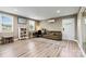 Inviting living room features lots of natural light, a comfy couch, and functional built-ins, perfect for work or relaxation at 3615 Kimber Ln, Sherrills Ford, NC 28673