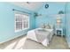 Light and airy bedroom with a cozy window, soft carpet, and pretty decor at 6005 Abergele Ln, Matthews, NC 28104