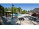 A community pool with pool furniture, a gazebo, and playground offers recreational opportunities for residents at 6005 Abergele Ln, Matthews, NC 28104