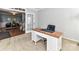 Cozy office space with a wooden desk and access to the living area at 6005 Abergele Ln, Matthews, NC 28104