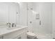 Modern bathroom with glass enclosed shower and marble vanity top at 6712 Cove Ln, Sherrills Ford, NC 28673