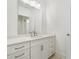 Bathroom with stone countertop, undermount sink and glass enclosed shower visible in the mirror at 6712 Cove Ln, Sherrills Ford, NC 28673