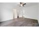 Spacious bedroom features hardwood floors and three doorways at 6712 Cove Ln, Sherrills Ford, NC 28673
