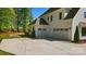 A spacious two-car garage with an extended concrete driveway, offering ample parking at 6712 Cove Ln, Sherrills Ford, NC 28673