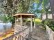 Charming gazebo by the lake offers a peaceful retreat with scenic water views at 6712 Cove Ln, Sherrills Ford, NC 28673