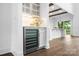 Dry bar with beverage cooler and built in storage close to main eat in kitchen at 6712 Cove Ln, Sherrills Ford, NC 28673
