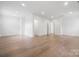 Spacious living room features hardwood floors, recessed lights and multiple doorways at 6712 Cove Ln, Sherrills Ford, NC 28673