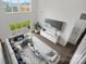 A living room with large windows, hardwood floors, a modern sofa, and a stylish marble-top console table at 6712 Cove Ln, Sherrills Ford, NC 28673