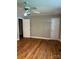 Bedroom featuring wood floor and two closets at 755 Victory Grove Church Rd, Lincolnton, NC 28092