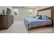Bedroom with a large bed, two windows, and gray walls with carpeted floors at 8004 Fountainbrook Dr # 15, Indian Trail, NC 28079