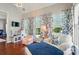 Bright bedroom with vaulted ceilings, hardwood floors, and large windows with patterned curtains at 8004 Fountainbrook Dr # 15, Indian Trail, NC 28079