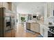 Open concept kitchen with stainless steel appliances and views of the dining area at 8004 Fountainbrook Dr # 15, Indian Trail, NC 28079