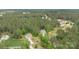 Aerial view of a home nestled within a lush, tree-filled neighborhood at 8112 Mossy Rock Rd, Waxhaw, NC 28173