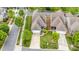 Aerial view of homes showcases the neighborhood's layout, green spaces, and proximity to streets at 9802 Sky Vista Dr, Huntersville, NC 28078