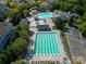 Aerial view of community pool featuring a lap pool, slide, zero entry, and covered area at 9802 Sky Vista Dr, Huntersville, NC 28078