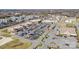 Aerial photo of community retail area, surrounding neighborhoods, and ample parking at 9802 Sky Vista Dr, Huntersville, NC 28078