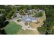 Aerial view of the community clubhouse, featuring a golf course and ample parking at 9802 Sky Vista Dr, Huntersville, NC 28078