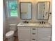Bathroom features a dual sink vanity with marble countertop and black hardware and trim at Lot 9 Lilly Pad Dr, Salisbury, NC 28146