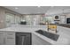 Contemporary kitchen showcasing stone countertops, stainless steel appliances, and an open layout at 10009 Lattice Ct, Charlotte, NC 28269