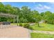 Backyard patio with pergola, fireplace, and a hot tub at 10012 Royal Colony Dr, Waxhaw, NC 28173