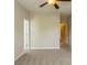 Bedroom with neutral walls, carpet, and a ceiling fan at 10012 Royal Colony Dr, Waxhaw, NC 28173