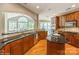 Gourmet kitchen with granite countertops, stainless steel appliances, and custom cabinetry at 10012 Royal Colony Dr, Waxhaw, NC 28173