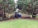 Backyard with patio and trees offering shade and privacy at 1012 Kings Mountain Ln, Gastonia, NC 28054
