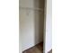 Empty closet with white walls, carpet flooring, and a wire rack for storage at 1012 Kings Mountain Ln, Gastonia, NC 28054