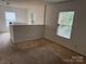 Upstairs loft area with a large window for natural light at 1012 Kings Mountain Ln, Gastonia, NC 28054