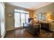 Home office with a large window and wood floors at 10319 Remembrance Trl, Huntersville, NC 28078