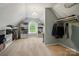 Large walk-in closet with plenty of shelving and clothing racks for optimal organization at 10319 Remembrance Trl, Huntersville, NC 28078