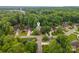 An aerial view of a home highlighting the property boundaries and tree coverage at 1033 Marguerite Dr, Lowell, NC 28098