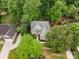 Beautiful aerial view of a home showcasing the roof, yard, and surrounding landscape at 1033 Marguerite Dr, Lowell, NC 28098