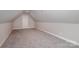 Nicely carpeted bonus room offers neutral paint, great lighting and ample room at 1033 Marguerite Dr, Lowell, NC 28098