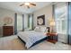 Charming bedroom with soothing blue accents and cozy furnishings at 1038 Gardenia St, Fort Mill, SC 29708