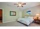 Cozy bedroom with neutral tones, soft carpet, and an art piece for a serene and relaxing atmosphere at 1038 Gardenia St, Fort Mill, SC 29708