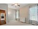 Bright, airy bedroom featuring two large windows and a classic white dresser at 1038 Gardenia St, Fort Mill, SC 29708