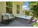Private outdoor deck featuring a relaxing hot tub, perfect for unwinding with a serene view and comfortable seating at 1038 Gardenia St, Fort Mill, SC 29708