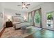 Serene main bedroom featuring a cozy sitting area and natural light at 1038 Gardenia St, Fort Mill, SC 29708