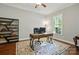 Bright home office with natural light, modern desk, and stylish decor at 1038 Gardenia St, Fort Mill, SC 29708