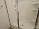 The bathroom's frameless shower door offers a modern look, with light tile and a shower head at 106 Calderdale Ln, Charlotte, NC 28262