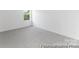 Bedroom has neutral carpeting, fresh paint, and a bright window that provides ample light at 111 Stonewater Dr # 25, Red Cross, NC 28129