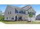 Charming two-story home featuring gray siding, black shutters, and a two-car garage at 111 Stonewater Dr # 25, Red Cross, NC 28129