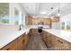 Modern kitchen equipped with stainless steel appliances, a large center island, and ample counter space illuminated by natural light at 111 Stonewater Dr # 25, Red Cross, NC 28129